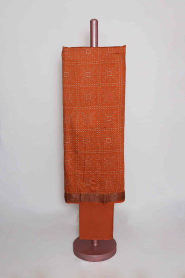 TANGERINE PRINTED TUSSAR SILK  ZARI BORDER UNSTITCHED SUIT SET